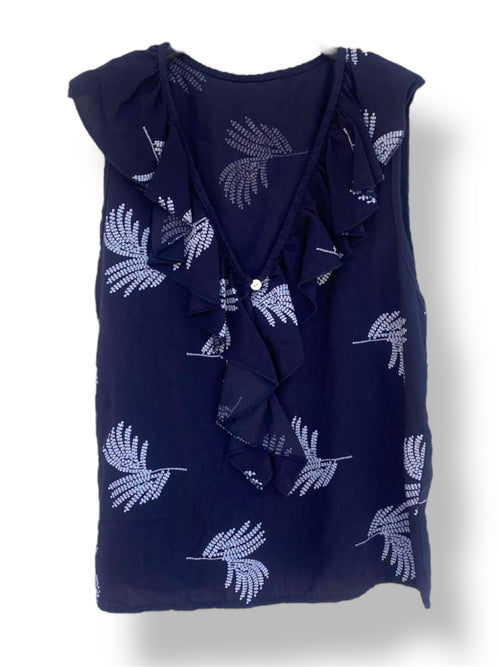 Blusa sin mangas con volantes