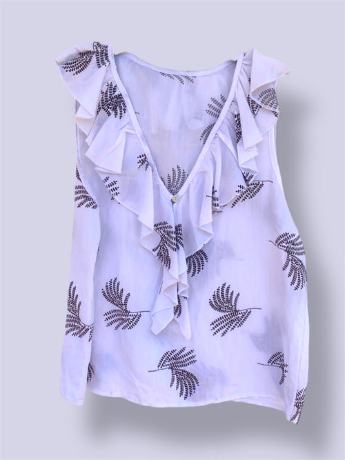 Blusa sin mangas con volantes