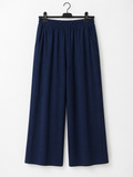 Pantalón fluido bolsillos