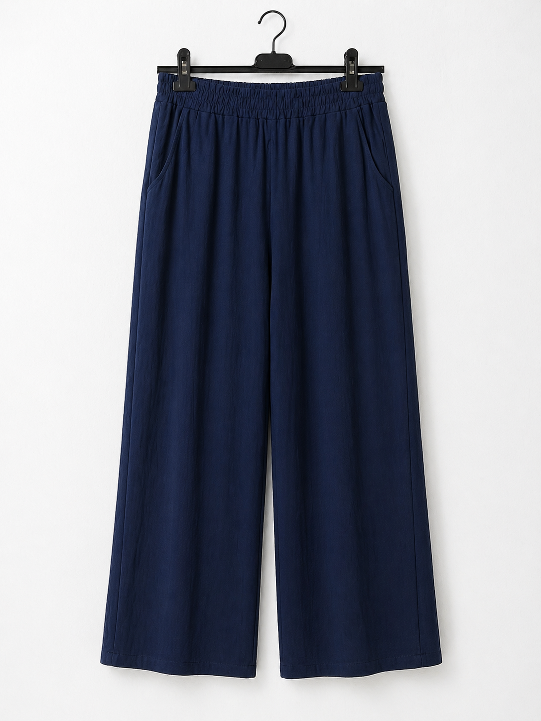 Pantalón fluido bolsillos